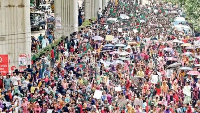 Scenes of unrest unfold as crowds march through city streets in Bangladesh.  